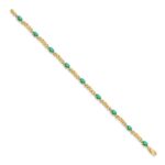 14k Complete Diamond and Oval Emerald X-design 7.25 inch Bracelet - Image 2