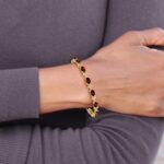 14k Complete Diamond and Oval Garnet Floral 7 inch Bracelet - Image 4