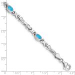 10k White Gold Blue Topaz 4 Stone Bracelet - Image 3