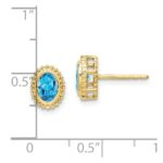 10k Oval Blue Topaz Post Earrings - Image 2
